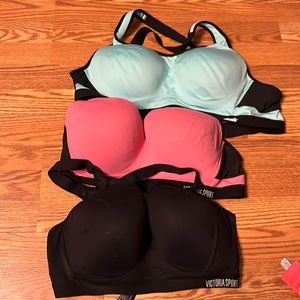 3 size 38DD sports bras. Two Victorias Secret and one is Avia